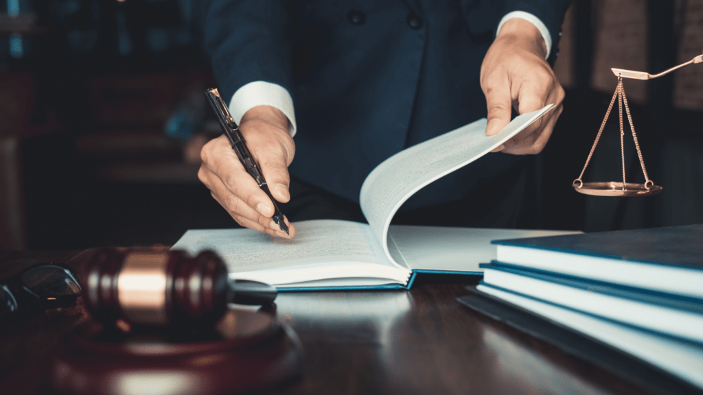 A lawyer holding a book