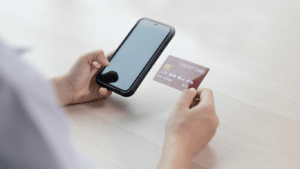 a person using a smartphone to pay