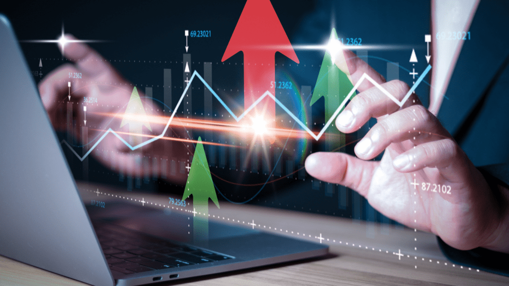 an image of a laptop with stock market graphs on it